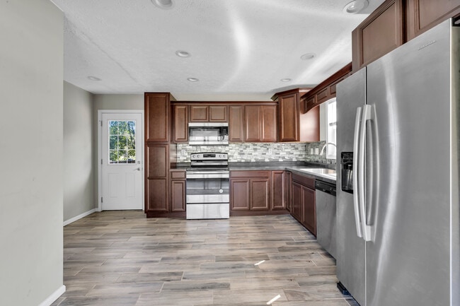 Building Photo - 9229 Donerail Way