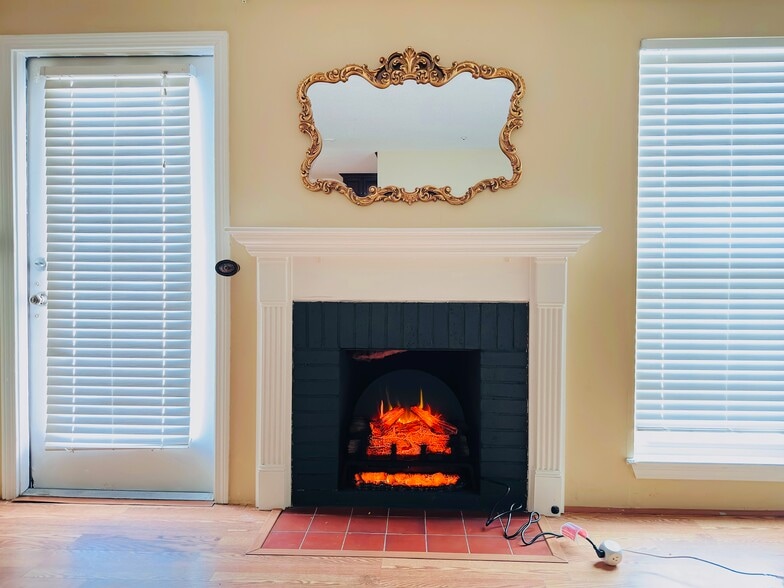 Living room with electric fireplace - 32 Walden Dr