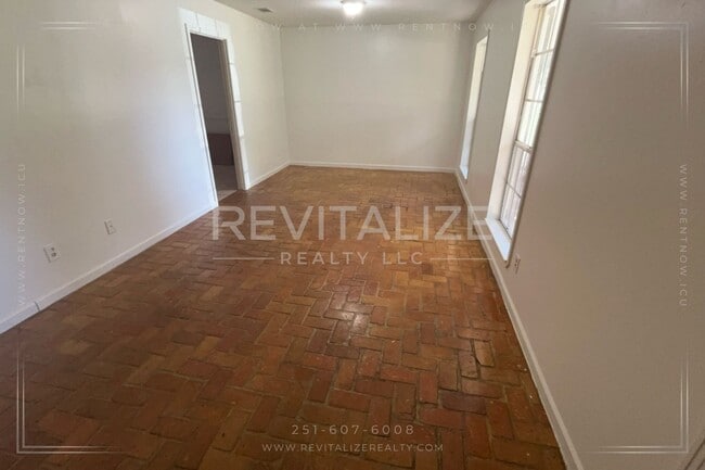 Building Photo - Brick Home with Carport