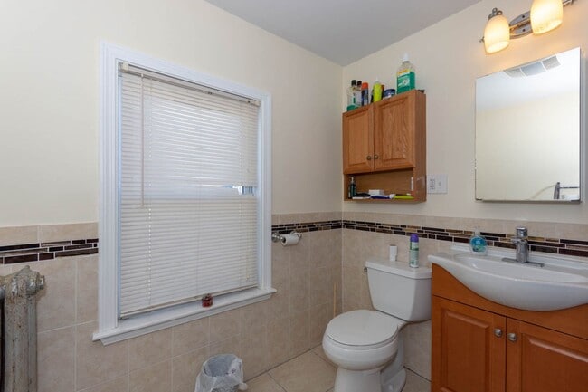Building Photo - No Brokers Fee, Heat and Hot Water Included, Top Floor Unit, Steps from the T Stop, Eat-in Kitche...