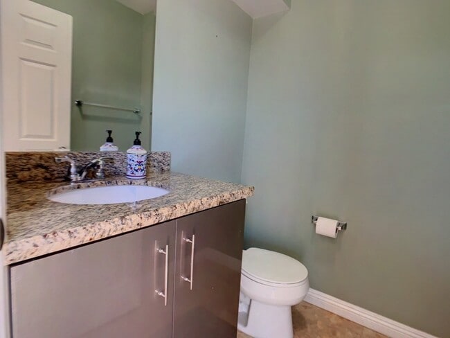 Building Photo - A Beautiful updated trilevel townhome in W Figueroa is now available for rent.