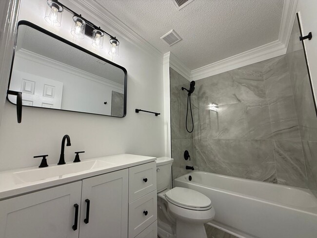 Building Photo - 3/3 Fully Renovated Town Home Available!