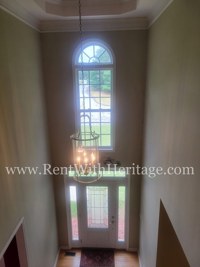 Building Photo - Gorgeous 3-Story Brick Home / 2 Fireplaces / Full Finished Basement / Chapel Hill Schools