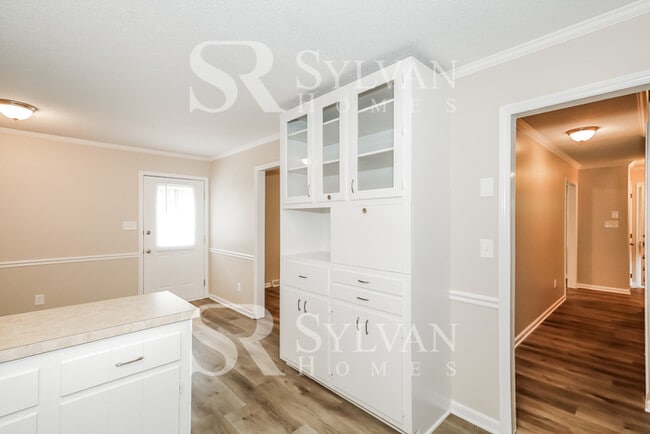 Building Photo - The living is easy in this 4 bedroom, 2 bathroom home