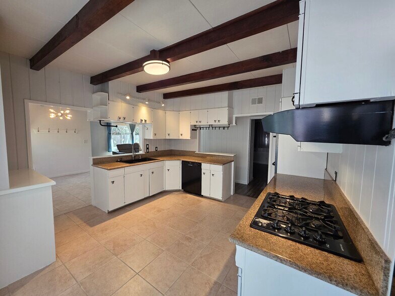 View into kitchen from sliding door, on the right you can just see Bedroom 1 - 456 E Indian Rock Rd