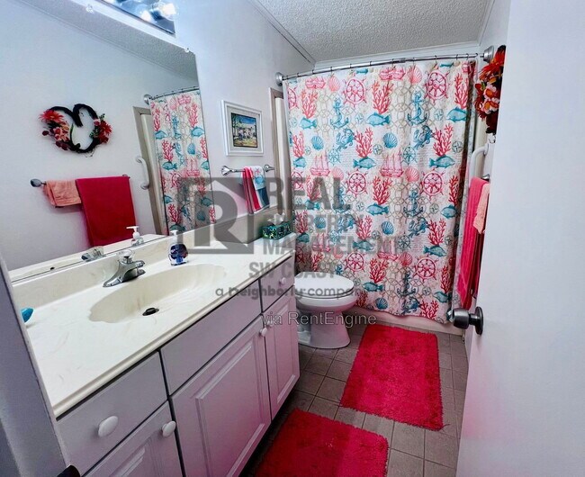 Building Photo - 202 Fan Palm Ln