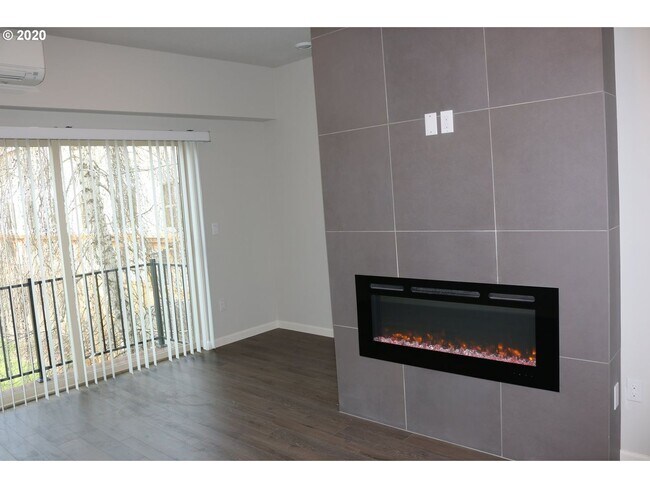 Building Photo - Modern 3-Bedroom Townhome-Style Home with Attached Garage, Private Patio & En-Suite Bathrooms in ...
