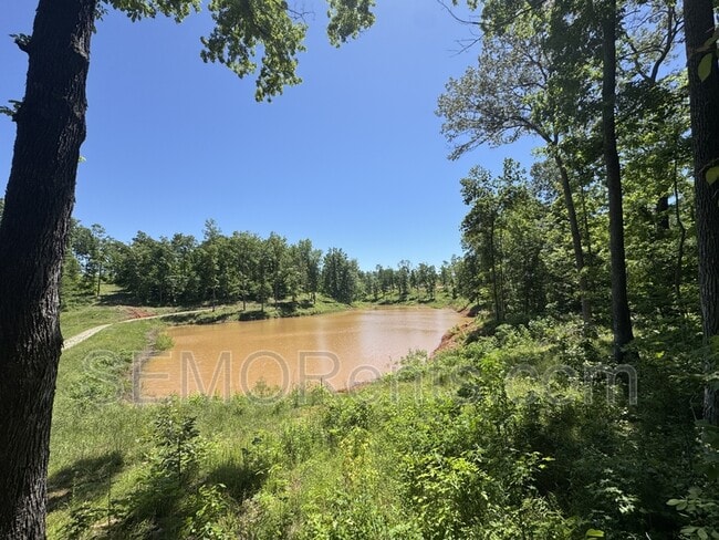 Building Photo - Sawmill Hollar RV Park - Pad 12