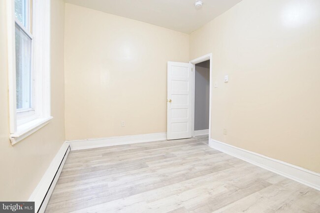 Building Photo - 7022 Woodland Ave