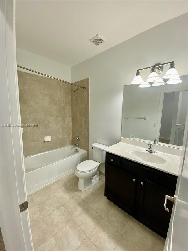 Building Photo - 9604 Town Parc Cir N