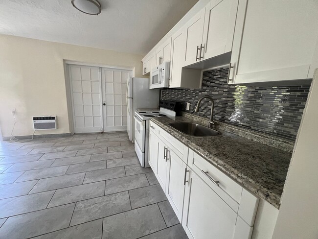 Primary Photo - Beautifully updated Two Bedroom PLUS Den/O...
