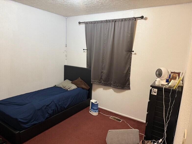 Small bedroom main floor - 7882 W Bridgton Dr