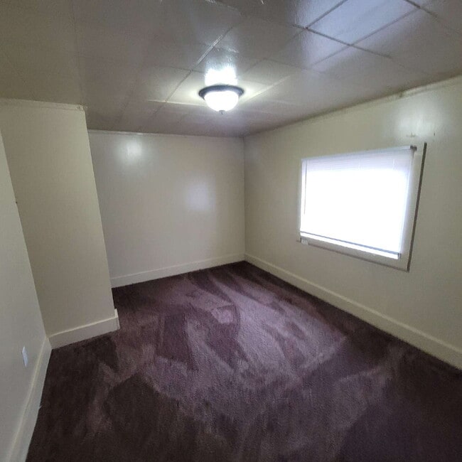 Building Photo - WEST SIDE HOUSE WITH 4 BEDROOMS, 2 BATHS, AND HUGE GARAGE/WORKSHOP COMBO