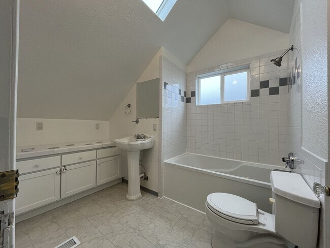 Building Photo - Character-Filled Concordia Home with Flexible Living Spaces & Gas Fireplace