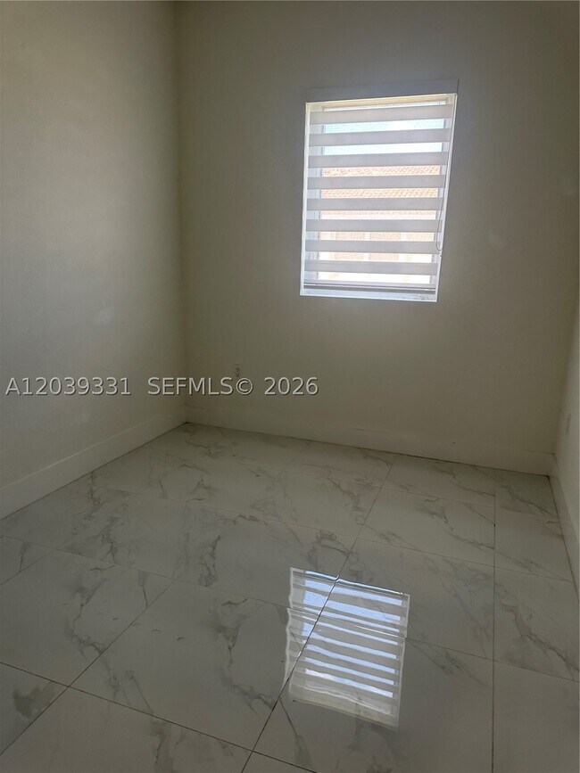 Building Photo - 6410 SW 139th Ave