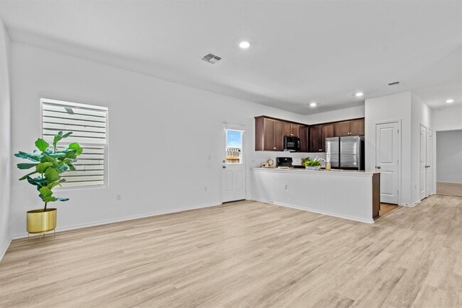 Building Photo - 7711 Poppy Petal Dr