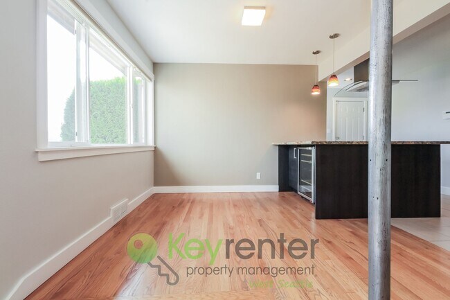 Building Photo - Waterfront Elegance with Private Dock and Designer Finishes