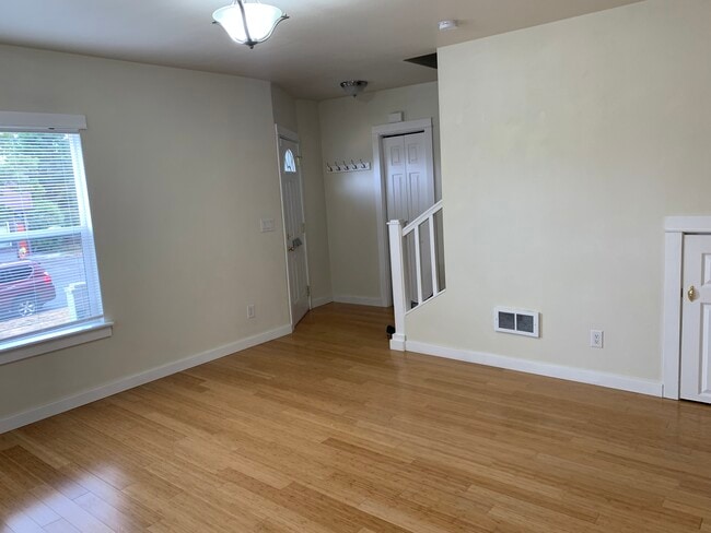 Living Room facing front door - 1603 S Ainsworth Ave