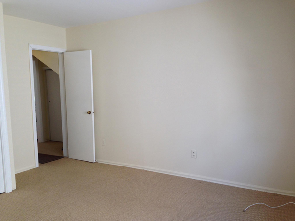 Bedroom view towrds the center hall. Lots of wall spoace for furnishings - 22 New St