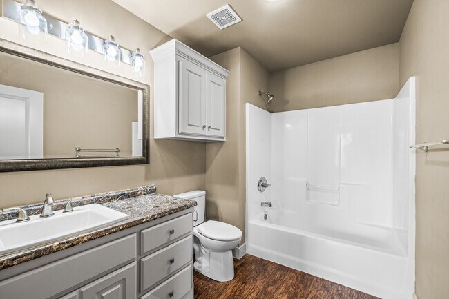 Building Photo - Spacious 3BR/2BA Duplex with 2-Car Garage & Stainless Appliances