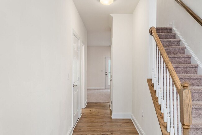 Building Photo - Your Next Home: Modern 3-Level Townhome with Garage, Deck & Huge Flex Space