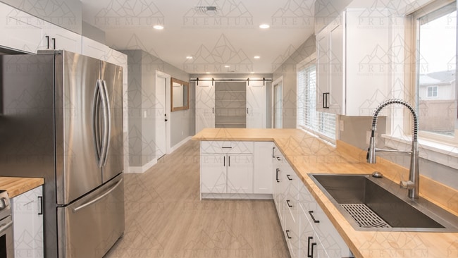 Building Photo - Renovated 3 bed 2 bath coming soon!