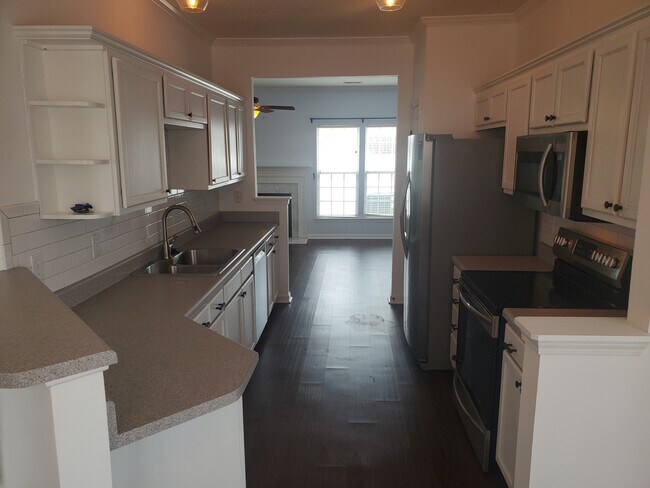 Galley kitchen featuring stainless steel appliances. - 42 Gr-Pd-51