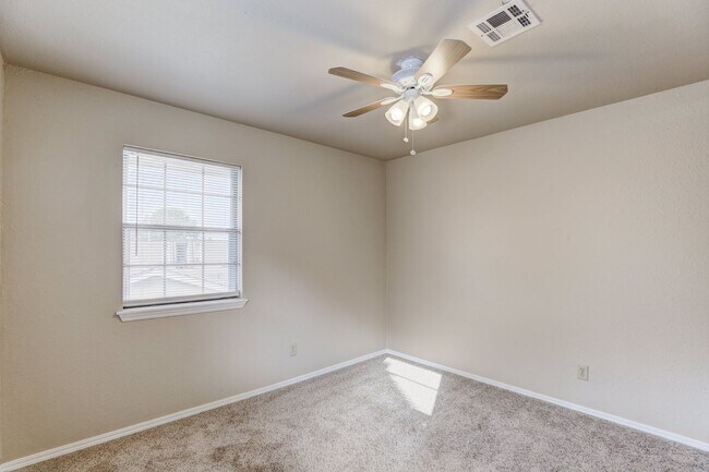 Building Photo - 4 Bedroom,2.5 Bath and 2 Car Garage Duplex with Fireplace and Prime Location Near Lake Hefner