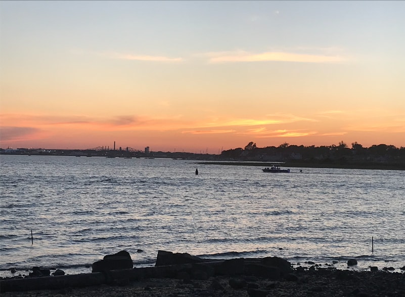 Sunset over the harbor across the street - 63C Brewster Ave