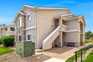 Building Photo - 3 Bed Top Floor Condo near Ft. Carson in Gated Community with detached Garage
