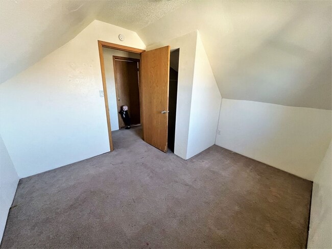 Building Photo - 801 E 6th- 4 bedroom house