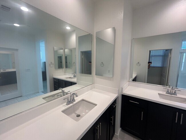 Building Photo - Modern 4 Bedroom Home with Downstairs Suite, Owned Solar & Resort-Style HOA Amenities