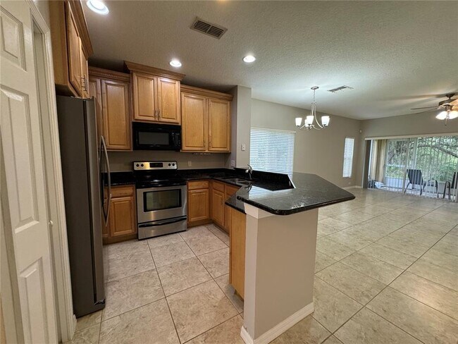 Building Photo - 8552 Trail Wind Dr