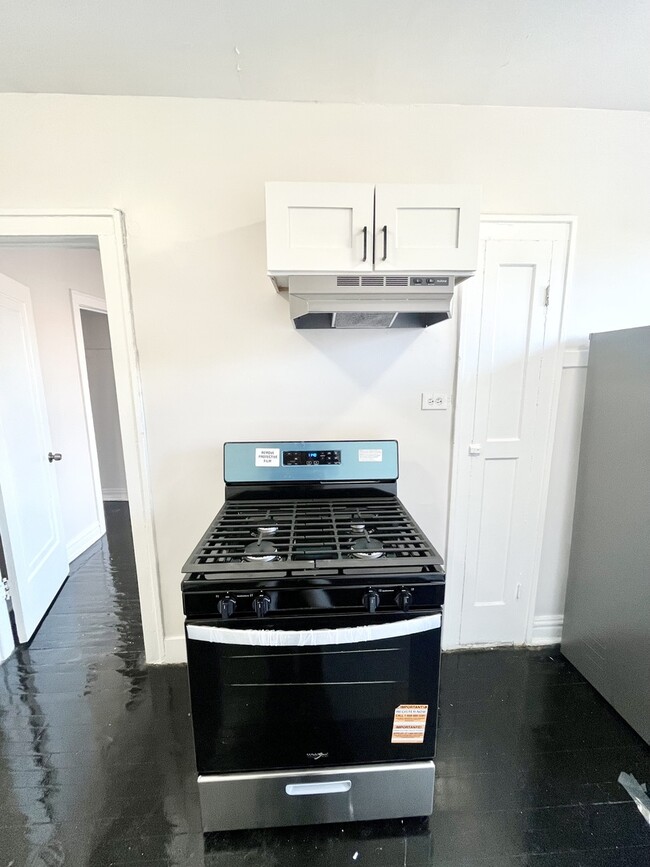 Building Photo - 4126 W 24th Pl