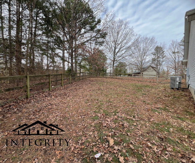 Building Photo - Home with a Fenced in Backyard Close to FLW