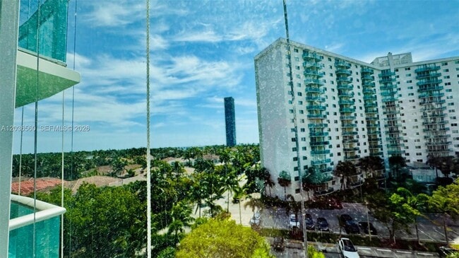 Building Photo - 19390 Collins Ave