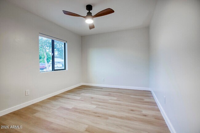 Building Photo - 8015 W Roma Ave