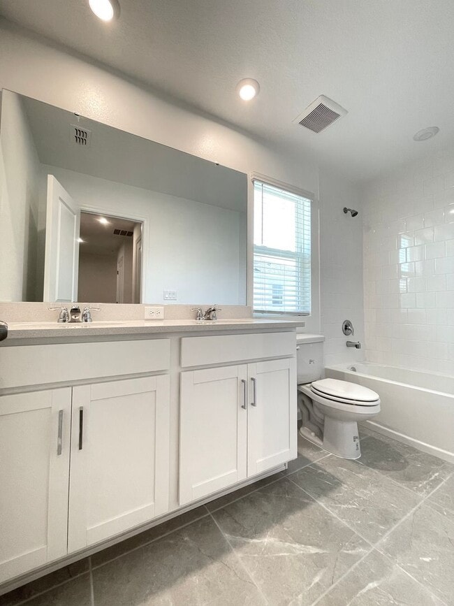 Building Photo - Newer 4 Bedroom, 2.5 Bath Corner Unit Town...