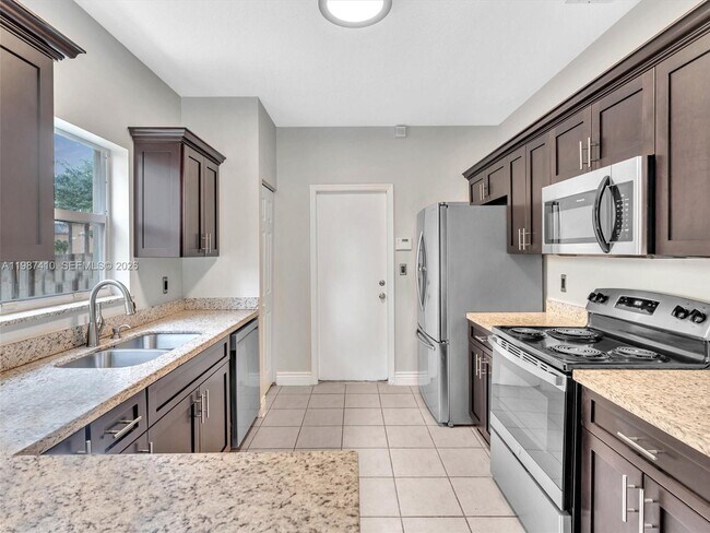 Building Photo - 1498 SW 106th Ave