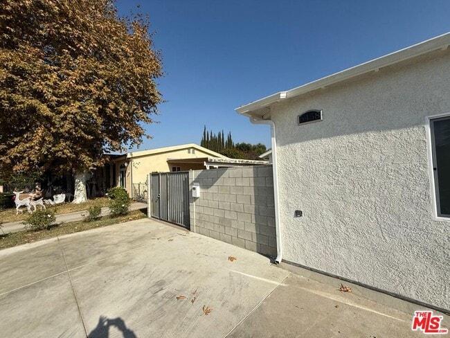 Building Photo - 6458 Nagle Ave
