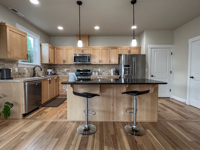 Building Photo - Enjoyable 4-Bed, 2.5-Bath Corner Lot Home in High-Tech Area!
