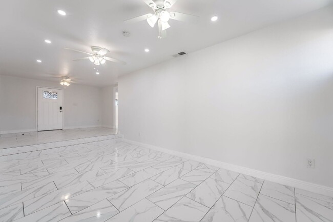 Building Photo - Single Story,  Totally Renovated , 3 bedroom, 2 bathroom Home with  extensive privacy and gated h...