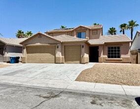 Building Photo - Spacious 4BD/3BA NLV Home with Downstairs ...