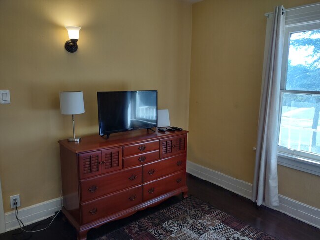 smaller bedroom with TV - 2142 S Victoria Ave