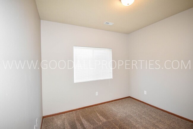 Building Photo - Spring Move-in special; 2 Bedroom 2 Bath Condo on the Ground level with detached garage!