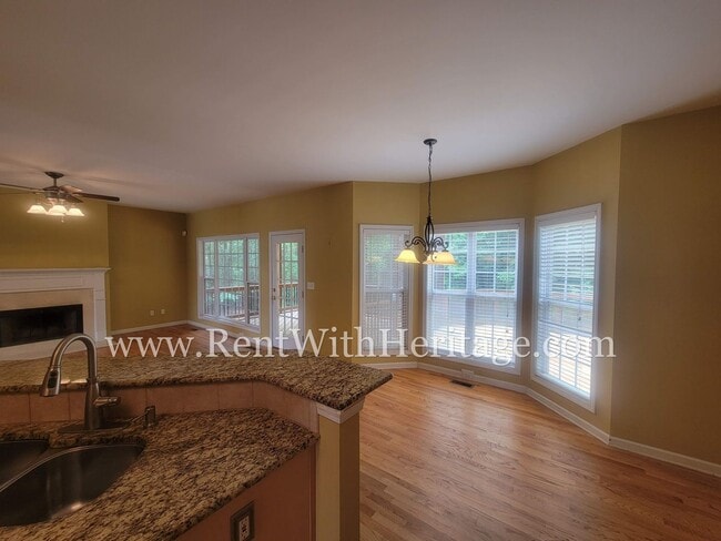 Building Photo - Gorgeous 3-Story Brick Home / 2 Fireplaces / Full Finished Basement / Chapel Hill Schools