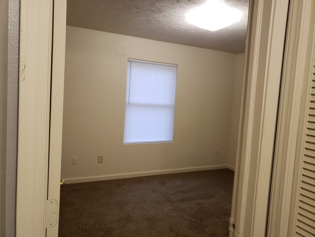 Front Bedroom - 819 Antler Dr