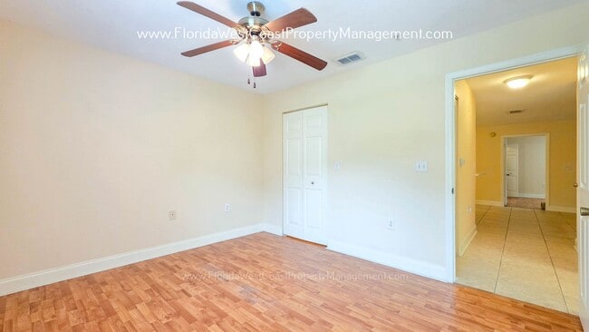 Building Photo - MOVE IN READY! LARGE 2 BEDROOM/2 BATH PLUS ATTACHED GARAGE! TILE/LVP THROUGHOUT!