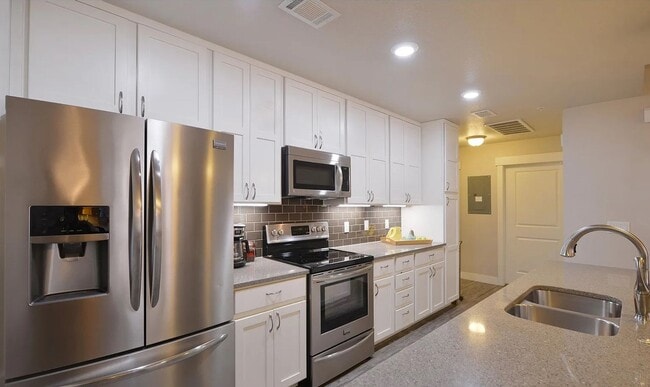 Building Photo - Urban Living at The Flats at Rigden Farm –...