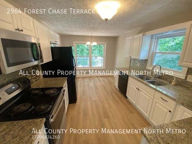 Building Photo - Updated 4BR/3BA in Lassiter High School Di...